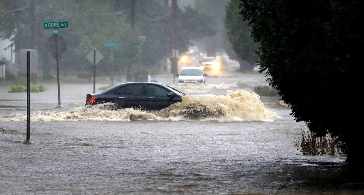 Flooded Street with Car in Middle